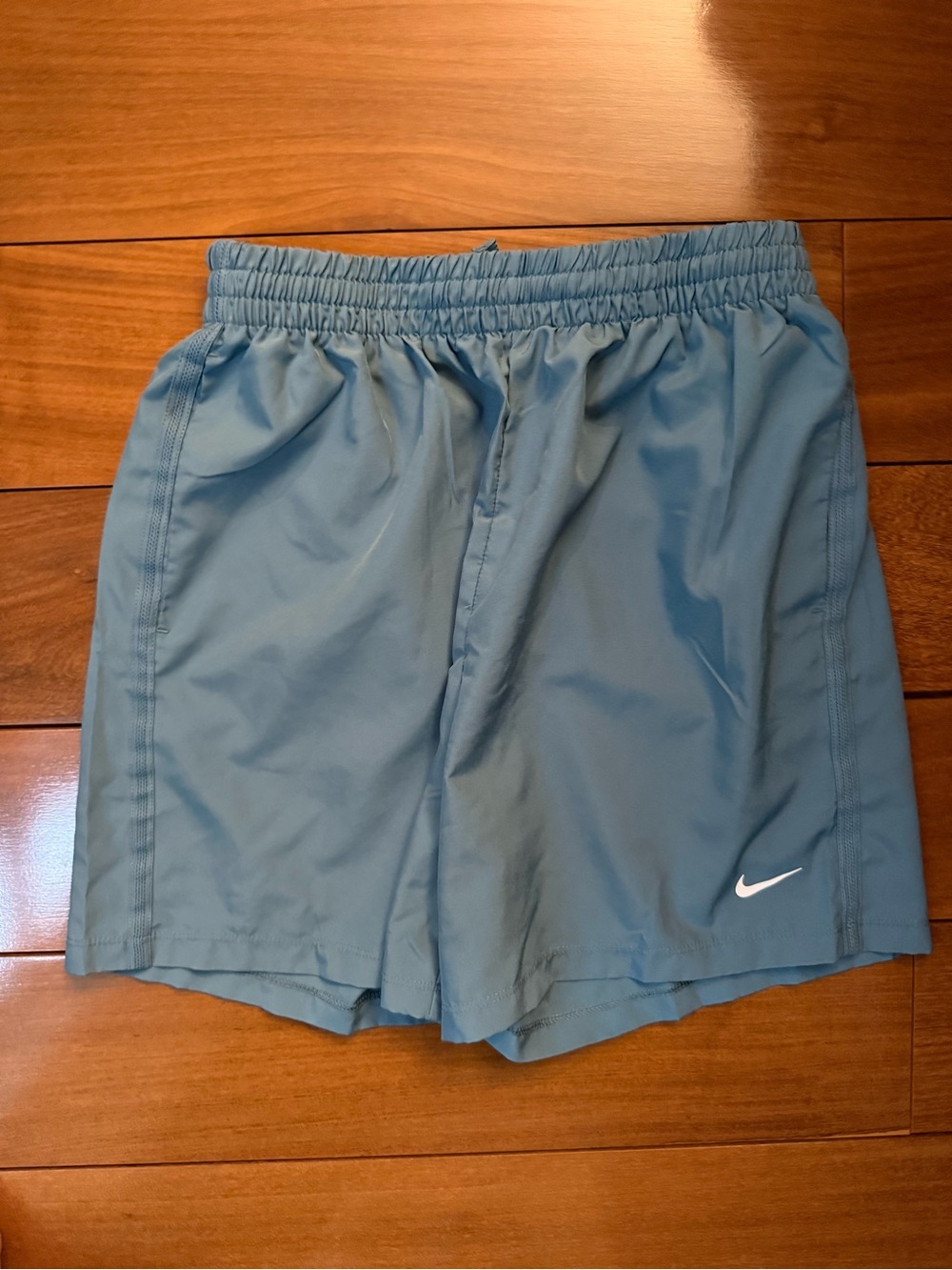 Nike kids grey Athletic Shorts with White Swoosh